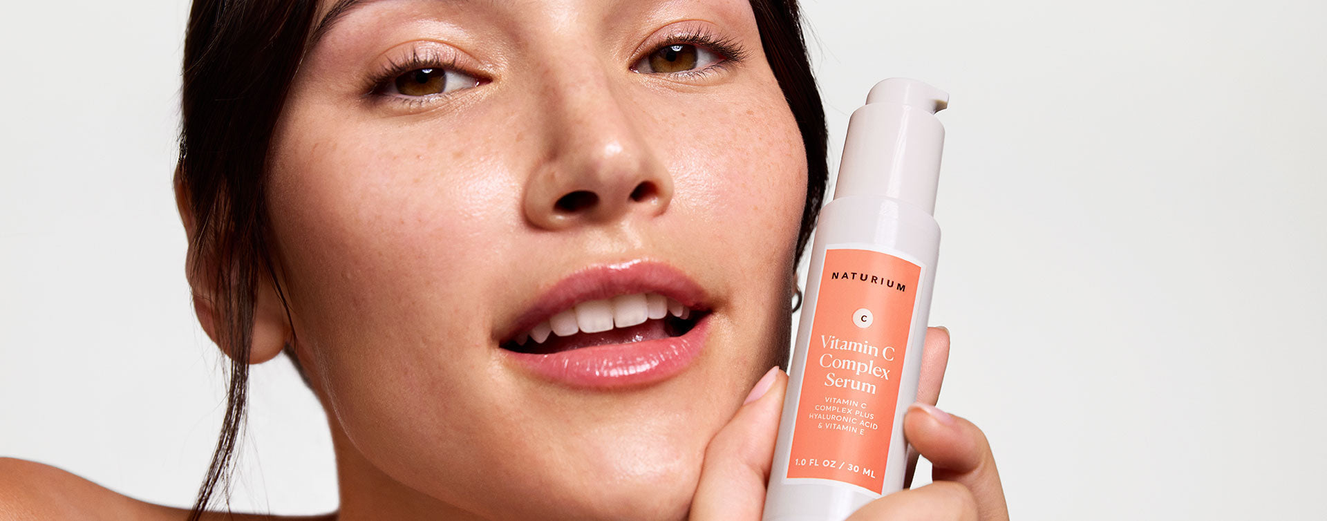 Woman holding Vitamin C Serum Complex
